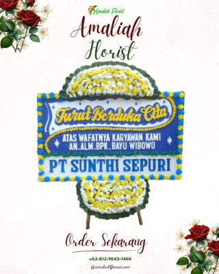 Papan Bunga Duka di Besar